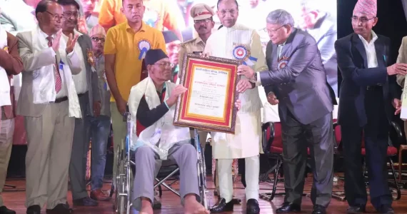 Bikram Bir Thapa receiving Kanchenjunga Rashtriya Sahitya Purashkar